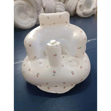 Inflatable baby chair in a bathtub with water-safe material visible