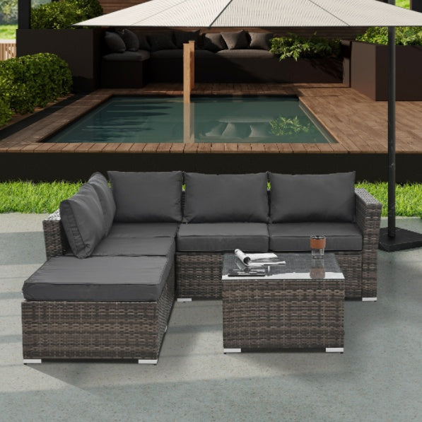 4‑Piece PE Wicker Patio Set with Tempered Glass Table