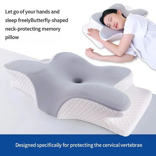 Cooling memory foam cervical pillow with contoured shape on white background