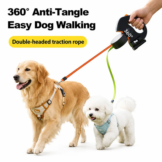 Retractable dual dog leash with built-in poop bag dispenser held by a hand