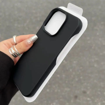 Graphite half-pack case shown open with accessories inside