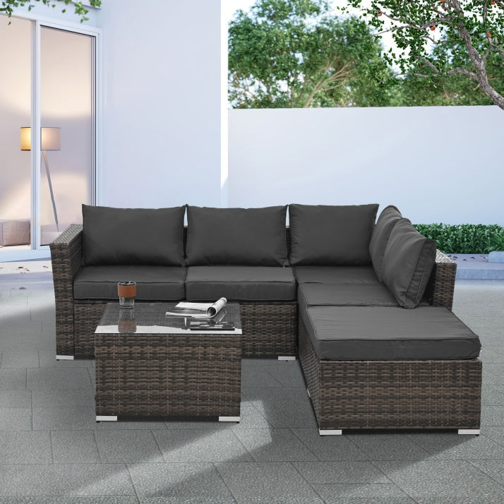 4‑Piece PE Wicker Patio Set with Tempered Glass Table