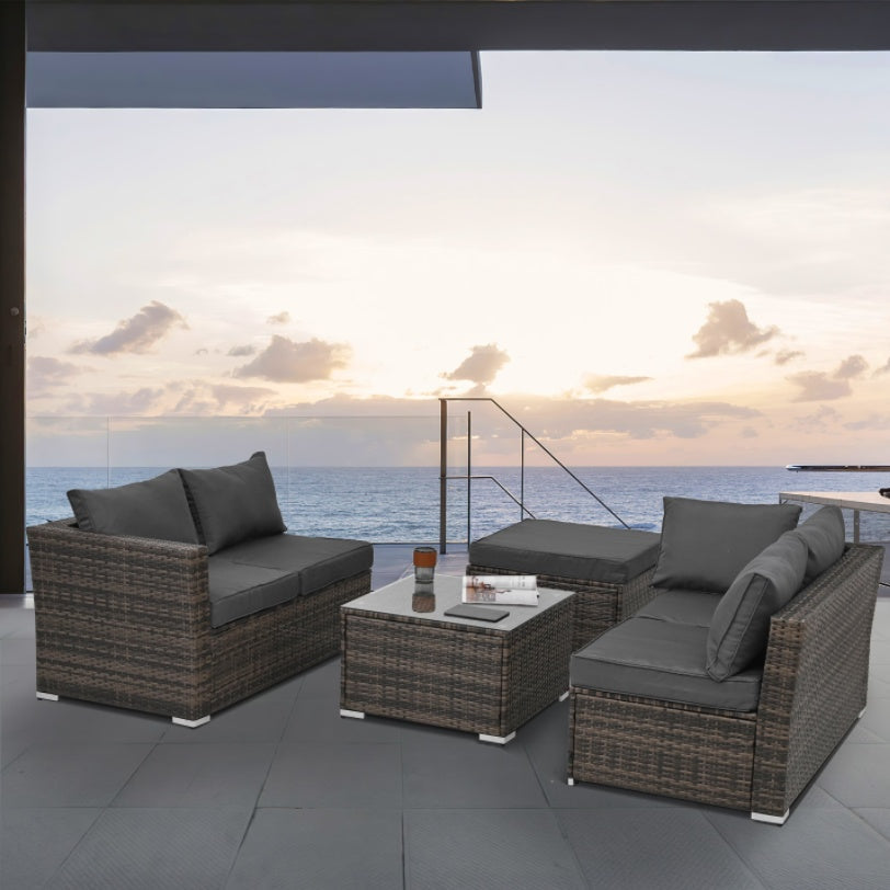 4‑Piece PE Wicker Patio Set with Tempered Glass Table